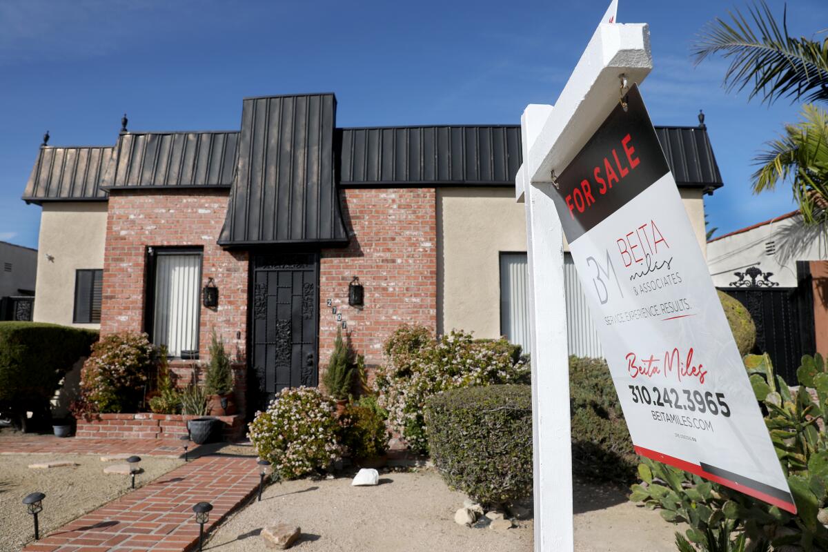 A photo of a for sale sign in front of a home in Inglewood in February. 