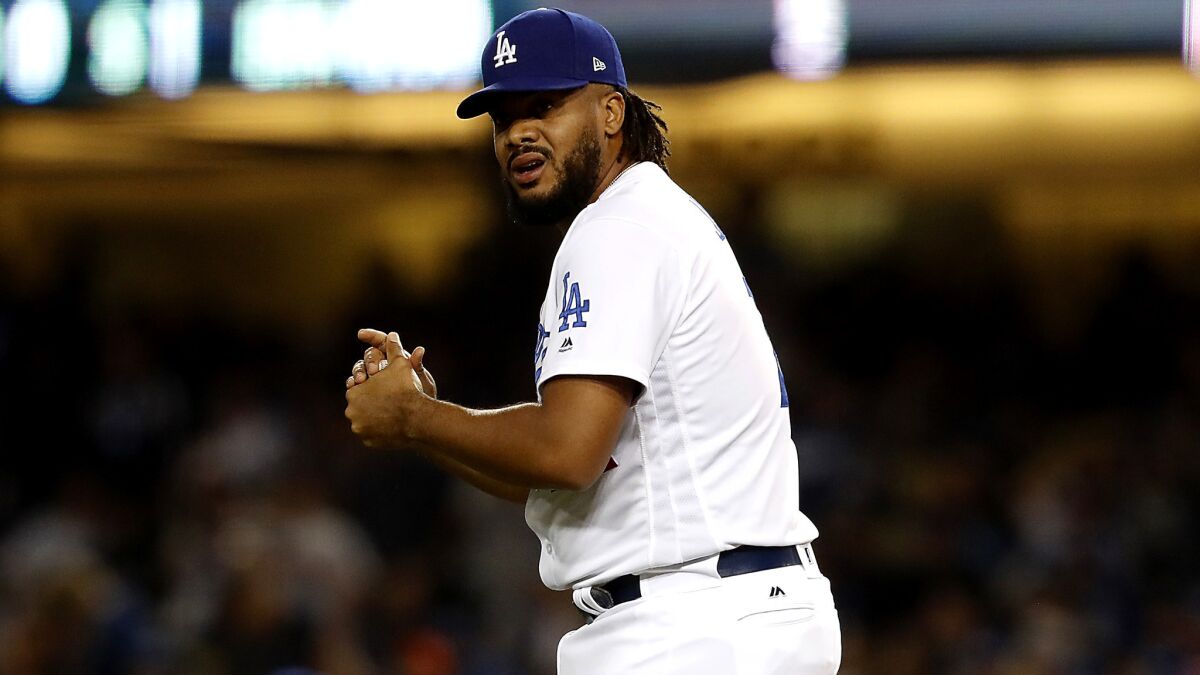 Dodgers closer Kenley Jansen reacts after giving up a solo home run to San Francisco Giants second baseman Joe Panik in the ninth inning on March 30 at Dodger Stadium.