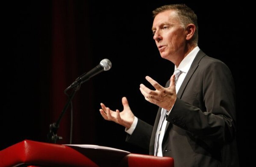 Los Angeles schools Supt. John E. Deasy, shown making his annual address to administrators at Hollywood High School last month, has withdrawn his endorsement of legislation that would speed up the overhaul of the state standardized testing system.