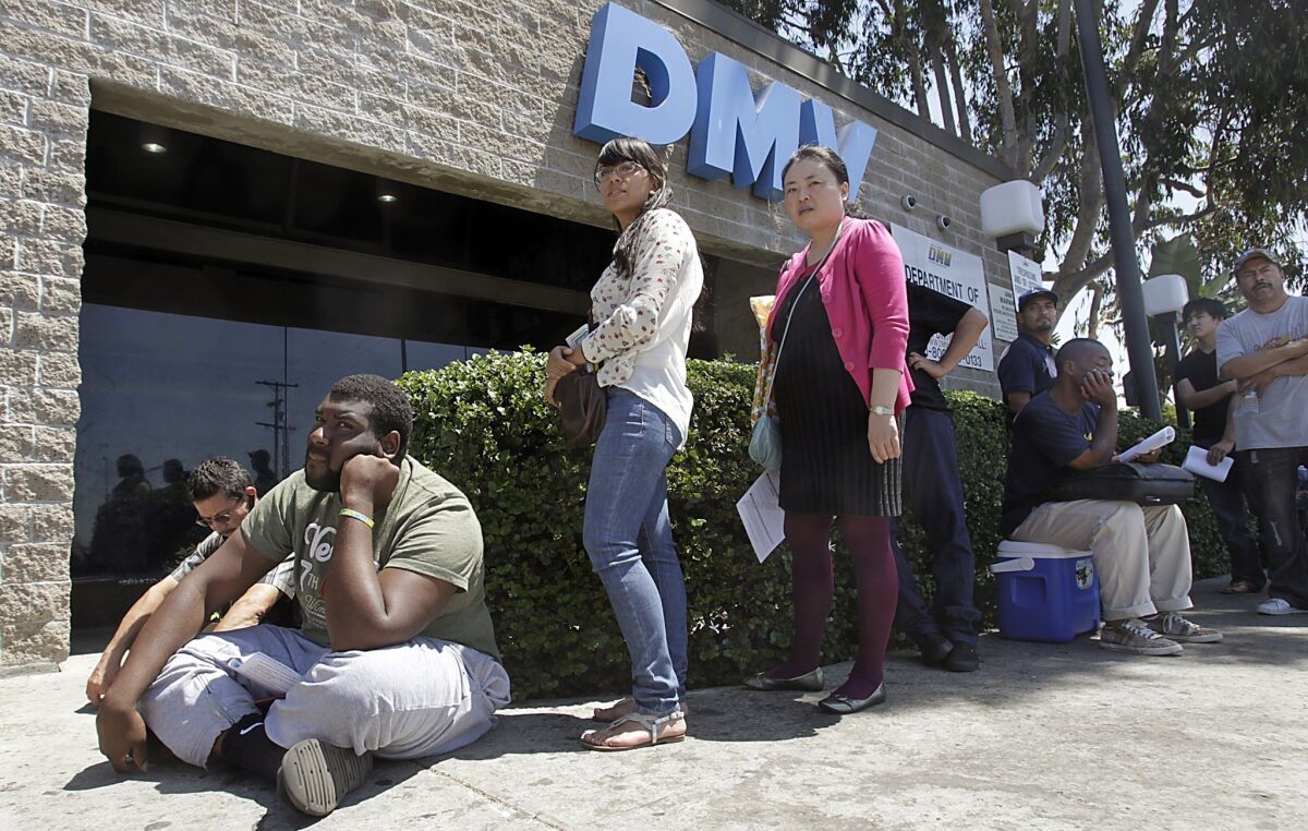 The DMV "has been alerted by law enforcement authorities to a potential security issue," according to a statement. A Los Angeles DMV branch is seen in 2012.
