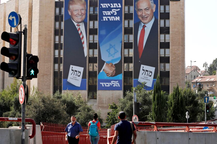 Election banner showing President Donald Trump shaking hands with Prime Minister Benjamin Netanyahu 