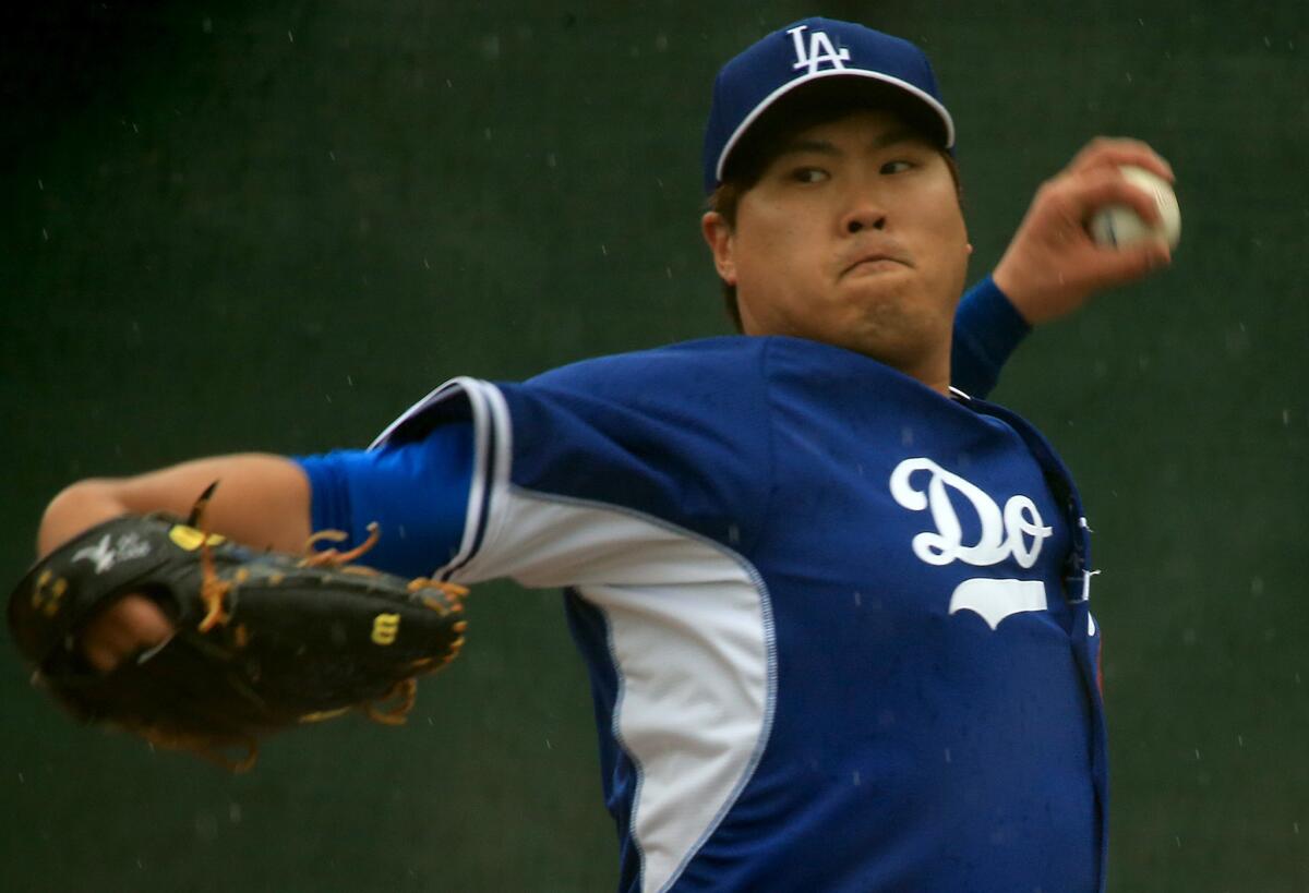 Hyun-Jin Ryu pitches at Dodgers spring training in Glendale, Ariz., on March 2.
