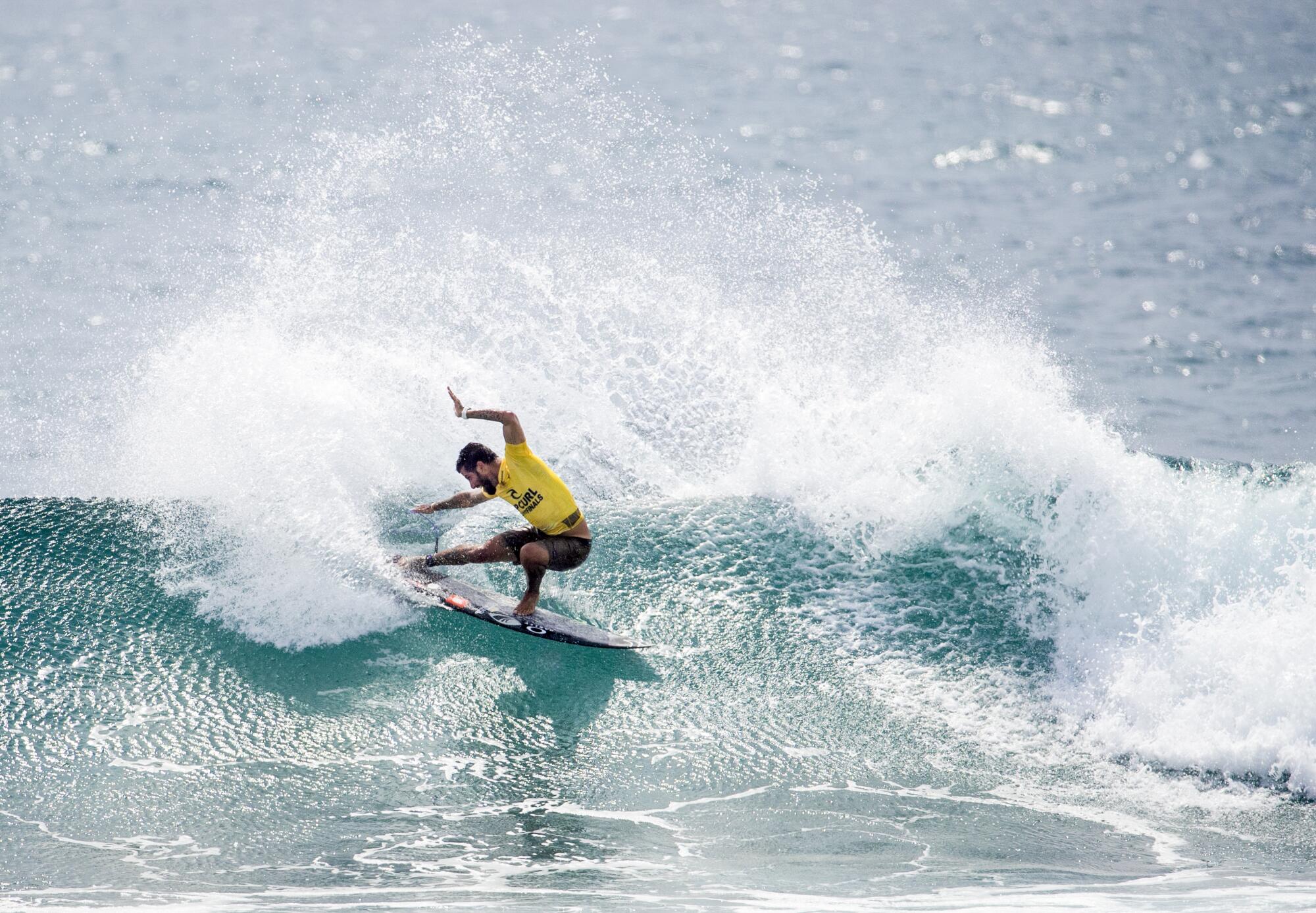 Filipe Toledo surfs in the final against Italo Ferreira to win his first world title.