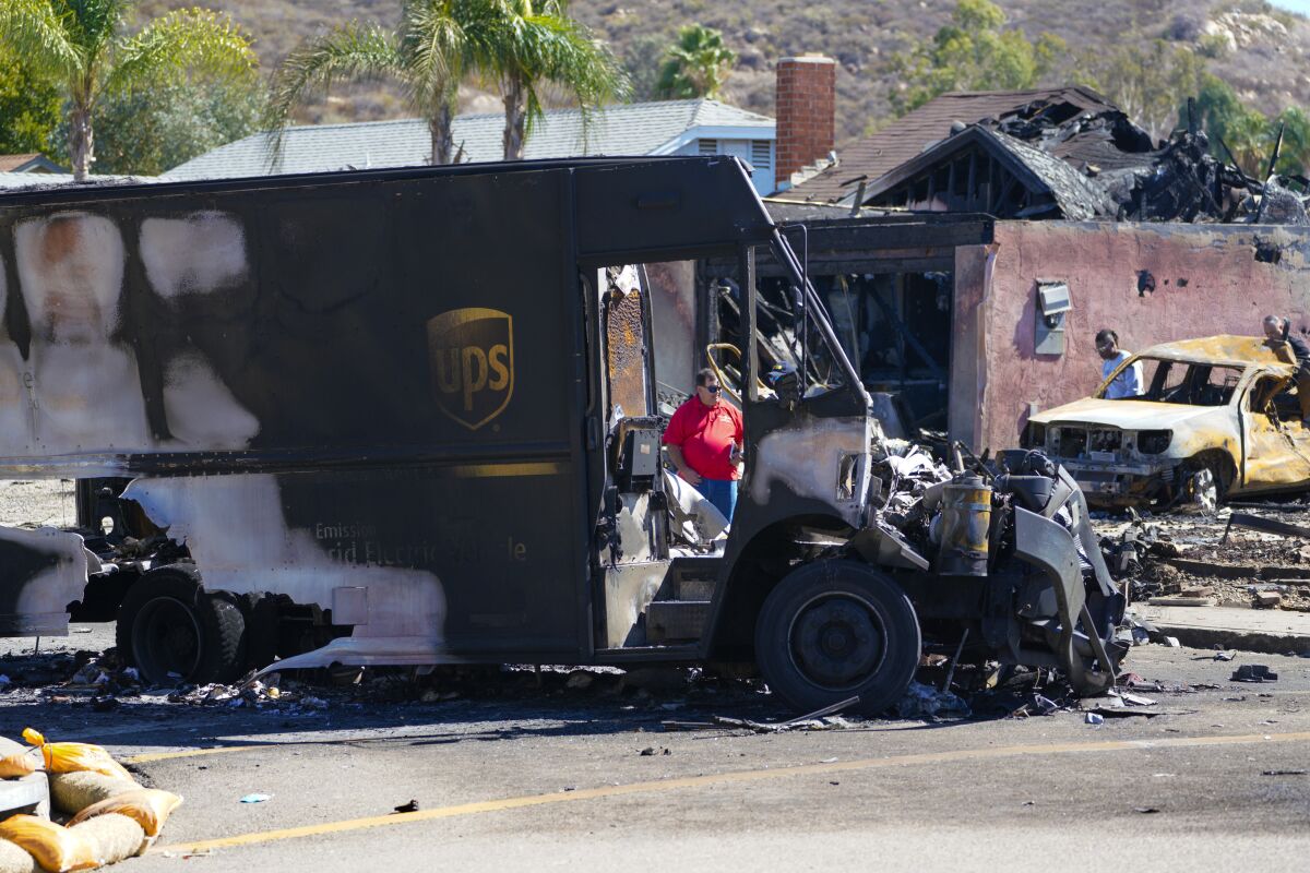 Ocean Beach resident Steve Krueger's UPS delivery truck after it was hit by a crashing plane in Santee in October 2021