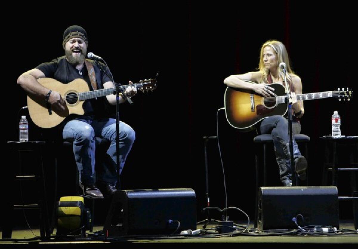 ALL FOR THE HALL: Zac Brown sings as Sheryl Crow looks on at the benefit concert for the Country Music Hall of Fame and Museum at Club Nokia.