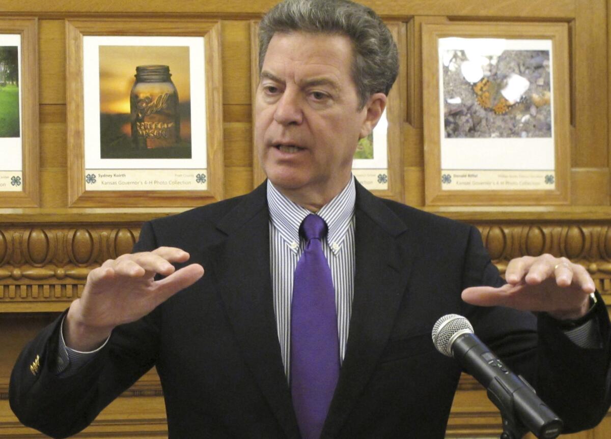 Kansas Gov. Sam Brownback pushed major tax cuts in the belief they would stimulate the state's economy.
