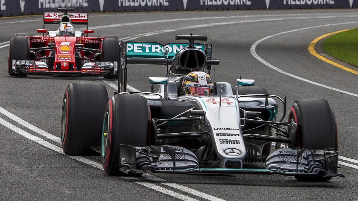 Formula One driver Lewis Hamilton is ahead of Sebastian Vettel during the qualifying session Saturday at the Australian Grand Prix in Melbourne.