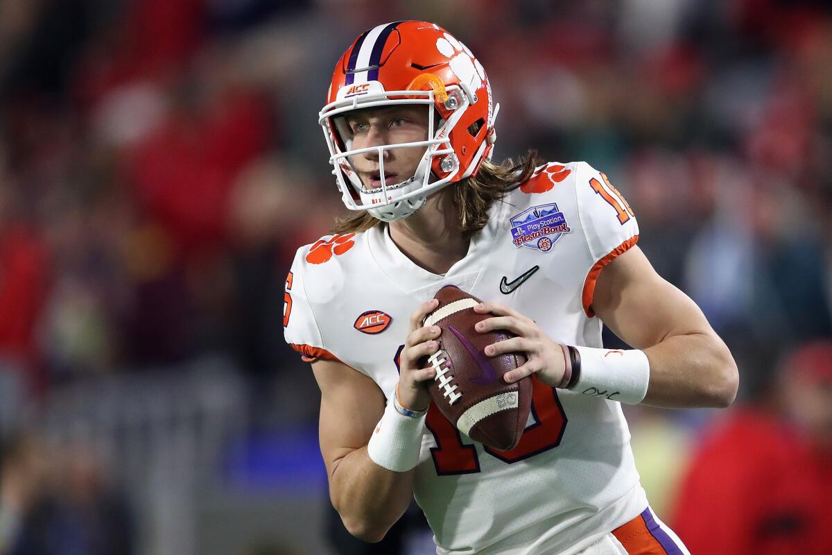 Clemson quarterback Trevor Lawrence warms up before a College Football Playoff semifinal game at the the PlayStation Fiesta Bowl against Ohio State on Dec. 28.