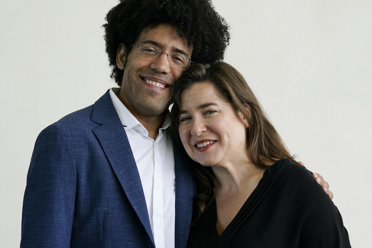 Cellist Alisa Weilerstein, right, and conductor Rafael Payare.