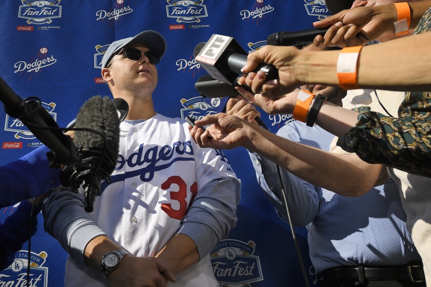 Dodgers outfielder Joc Pederson fields questions from reporters during Dodgers FanFest on Jan. 25, 2020, at Dodger Stadium.