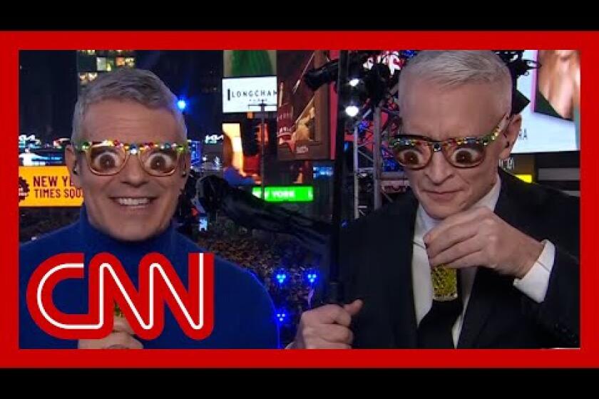 See Anderson Cooper and Andy Cohen take shots of mystery liquid