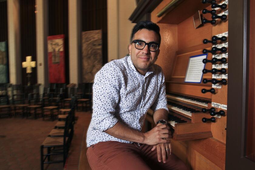 SAN DIEGO, April 25, 2017 | Ruben Valenzuela, Founder and Director of the Bach Collegium San Diego, sits at the organ at All Soul's Episcopal Church in San Diego on Tuesday. | Photo by Hayne Palmour IV/San Diego Union-Tribune/Mandatory Credit: HAYNE PALMOUR IV/SAN DIEGO UNION-TRIBUNE/ZUMA PRESS San Diego Union-Tribune Photo by Hayne Palmour IV copyright 2017