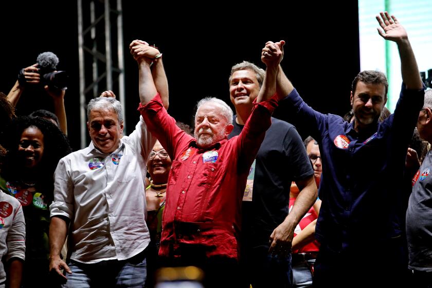 NOVA IGUACU, BRAZIL - SEPTEMBER 08: Presidential candidate and former president of Brazil, Luiz Inacio Lula da Silva, 76, center, commonly known mononymously as Lula, holds a campaign rally in the Rio de Janeiro metropolitan area on Thursday, Sept. 8, 2022 in Nova Iguacu, Brazil. Brazilian President Jair Bolsonaro, 67, used Brazil's Independence Day Celebration to rally voters ahead of the Oct. 2nd presidential elections. Bolsanaro will be running against Luiz Inacio Lula da Silva, commonly known mononymously as Lula, a Brazilian politician and former union leader who served as the 35th president of Brazil from 2003 to 2010. (Gary Coronado / Los Angeles Times)