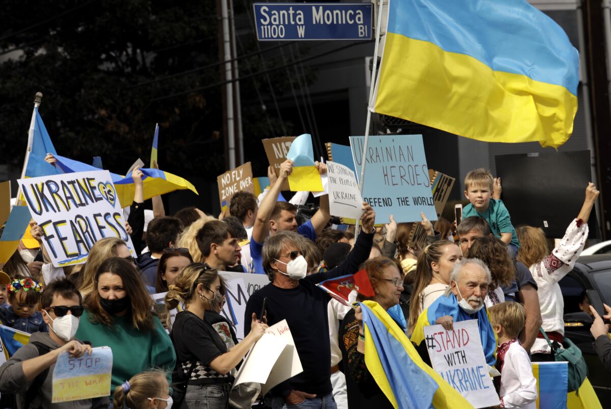 Hundreds of Ukrainian Americans and supporters of Ukraine rally to denounce Russia's invasion of Ukraine in Westwood.