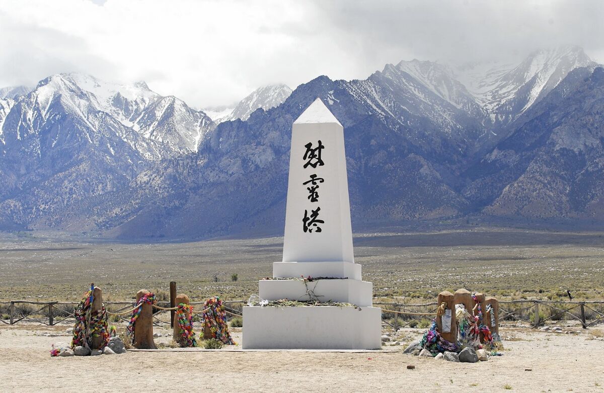 The iconic cemetery monument, or "soul consoling tower" is shown days after the 47th annual pilgrimage at the Manzanar Historical WWII Internment Camp. Mount Williamson is in the background.