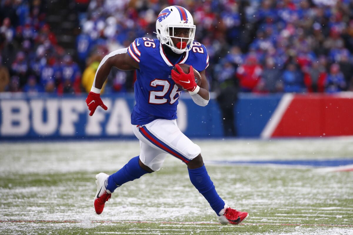 Buffalo Bills running back Devin Singletary carries the ball in the first half against the Atlanta Falcons.