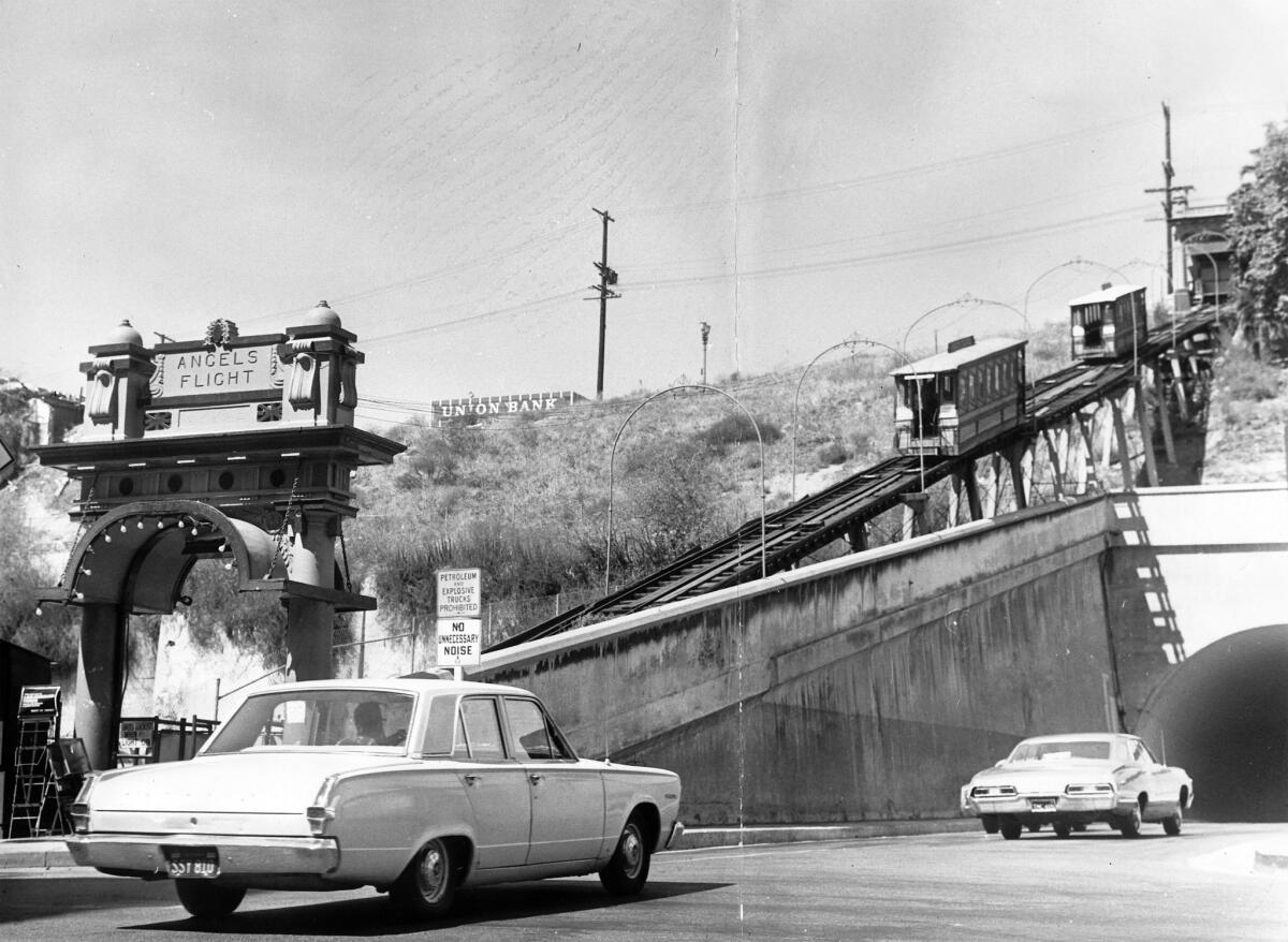By 1968, Bunker Hill had been denuded. Angels Flight, which has since been relocated, stands alone against a barren hillside.