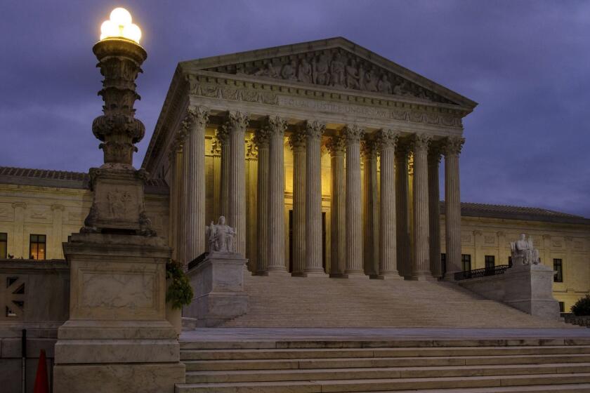 The U. S. Supreme Court building stands quietly before dawn in Washington, Friday, Oct. 5, 2018. The U.S. Senate will start the process of voting on Brett Kavanaugh's confirmation as a Supreme Court Associate Justice today. (AP Photo/J. David Ake)