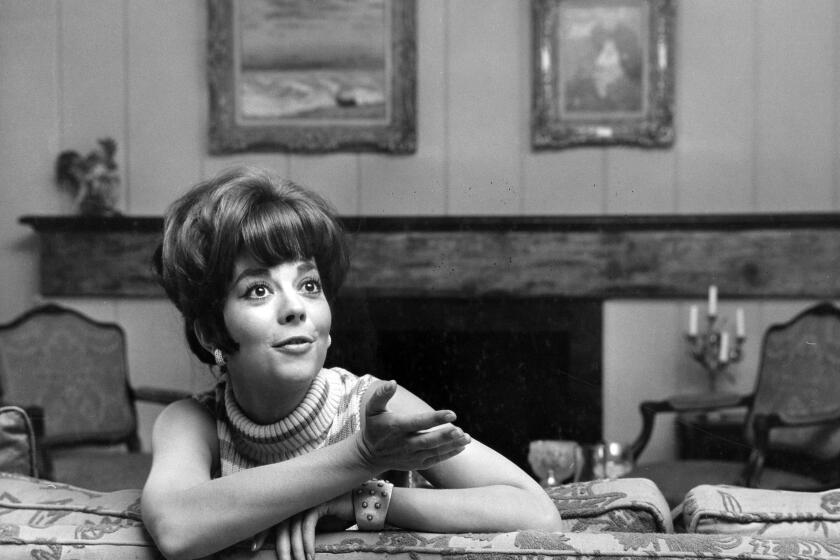July, 1966: Actress Natalie Wood plays a kooky kleptomaniac in movie "Penelope."