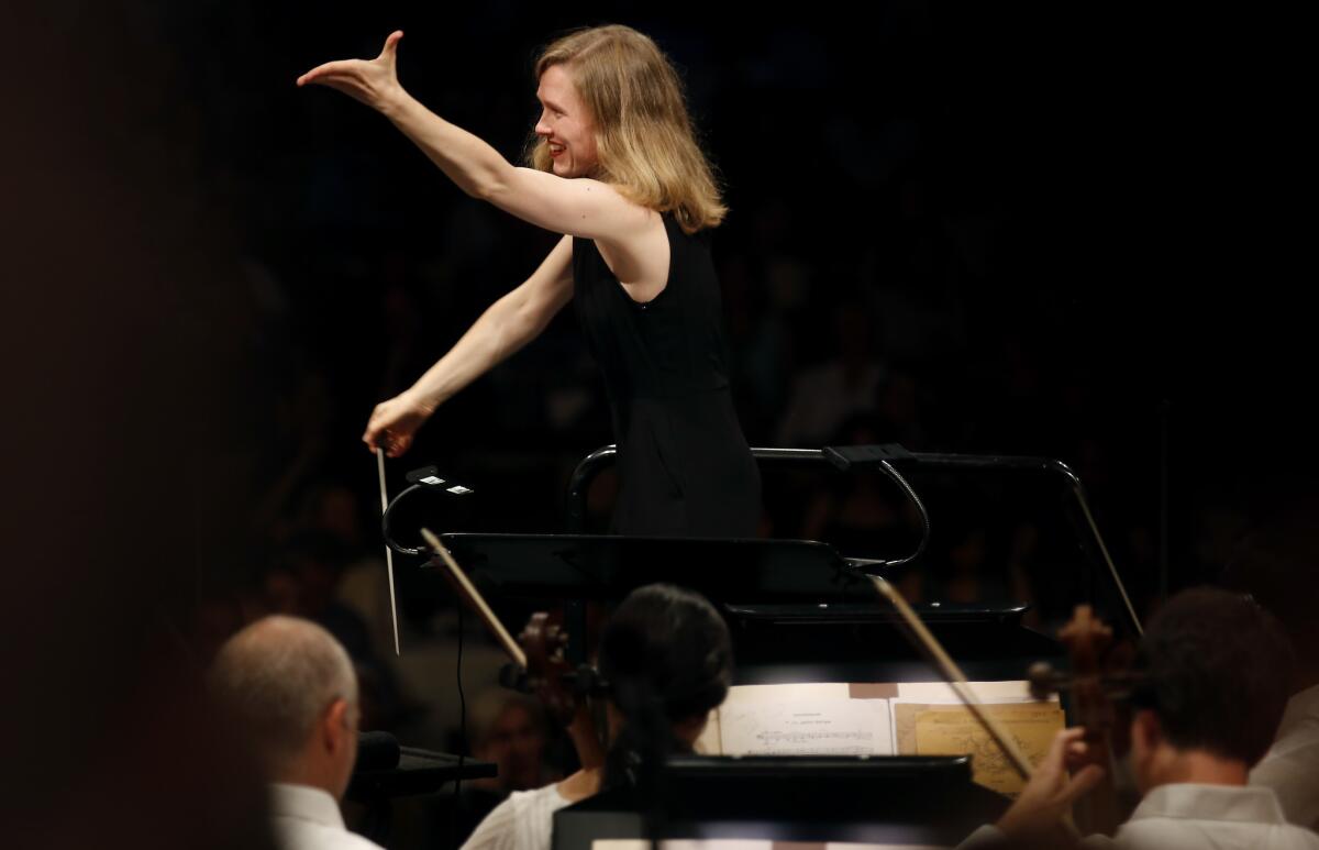 Mirga Grazinyte-Tyla conducting the Los Angeles Philharmonic at the Hollywood Bowl.