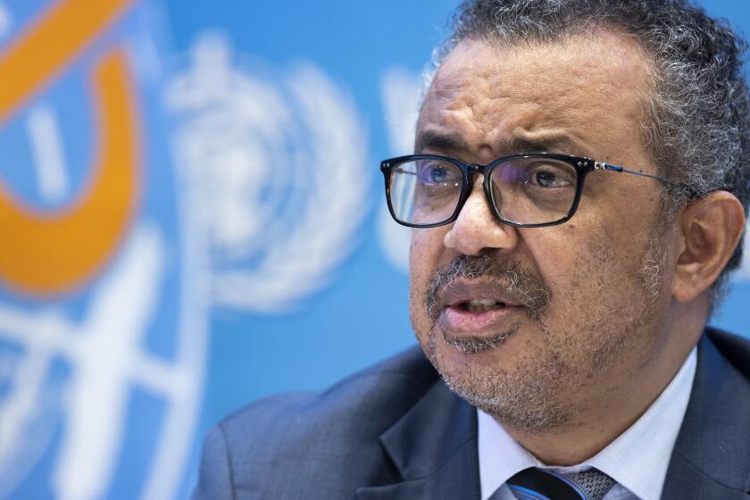 FILE - Tedros Adhanom Ghebreyesus, Director General of the World Health Organization talks to the media regarding the coronavirus COVID-19 at the World Health Organization headquarters in Geneva, Switzerland, Monday, Dec. 20, 2021. The World Health Organization chief made a passionate appeal for his embattled home region of Tigray in Ethiopia on Thursday, Aug. 25, 2022, saying he has relatives he cannot communicate with or send money to amid a blockade by government forces. (Salvatore Di Nolfi/Keystone via AP, File)
