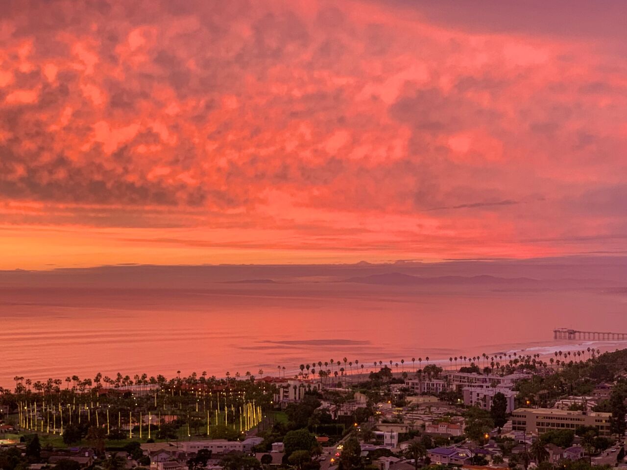 During this stunning sunset over La Jolla Shores, "the grove of palm trees at La Jolla Beach & Tennis Club looked like birthday candles from above," Kathryn Anthony says.