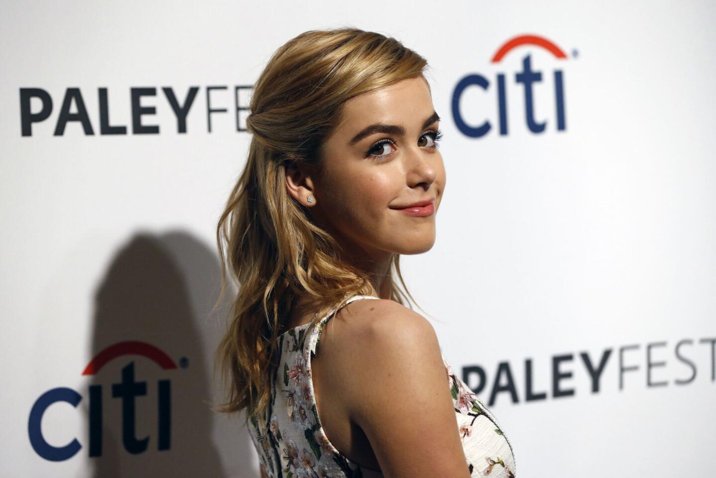 Cast member Shipka poses as she arrives for a panel discussion for the television series "Mad Men" during the William S. Paley Television Festival (PaleyFest) at the Dolby theatre in Hollywood