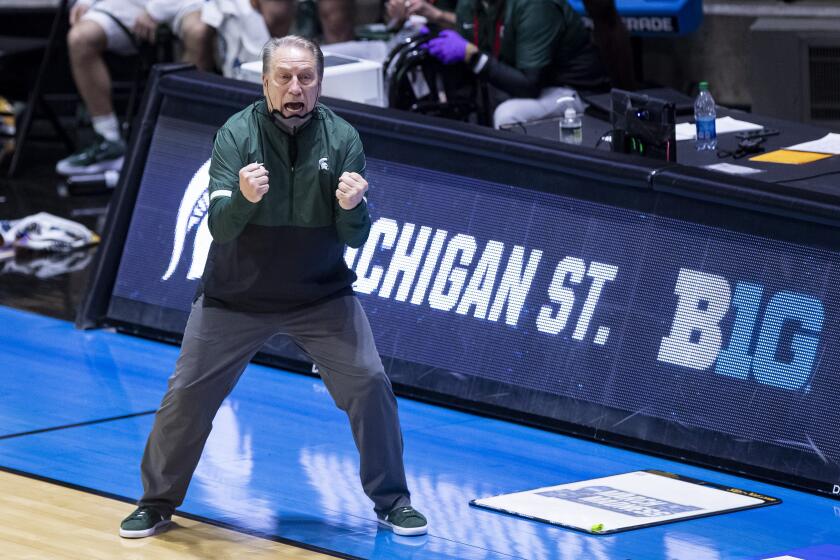 Michigan State coach Tom Izzo yells to players during the second half of a First Four game against UCLA in the NCAA men's college basketball tournament, Friday, March 19, 2021, at Mackey Arena in West Lafayette, Ind. UCLA won 86-80. (AP Photo/Robert Franklin)