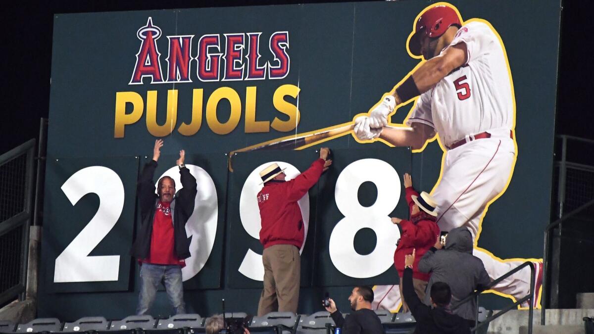 The Albert Pujols hit tracker at Angel Stadium is updated after he stroked a double against the Orioles for his 2,998th career hit.