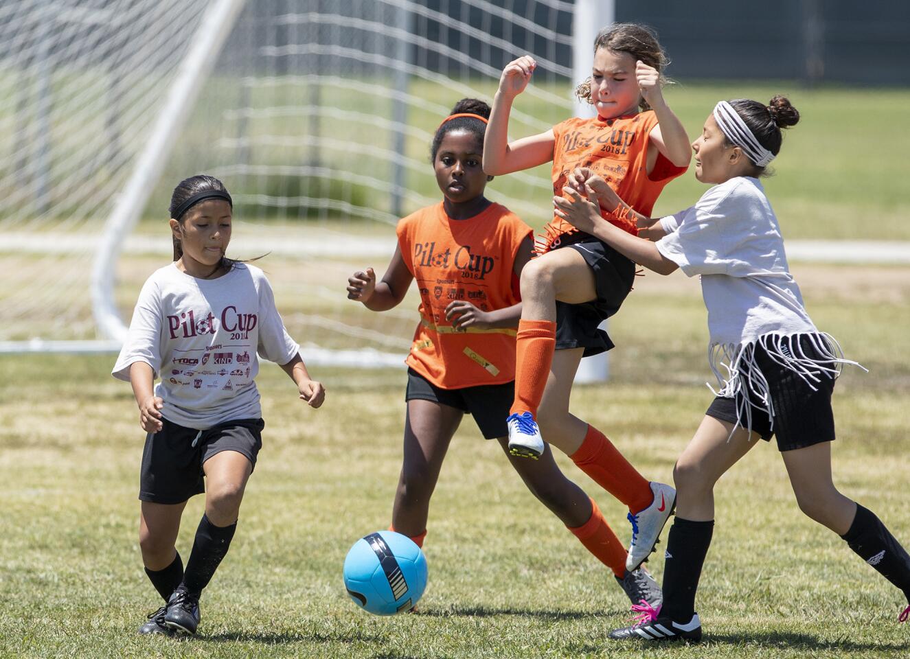 Photo Gallery: A girls' Bronze Division quarterfinal match at the Daily Pilot Cup