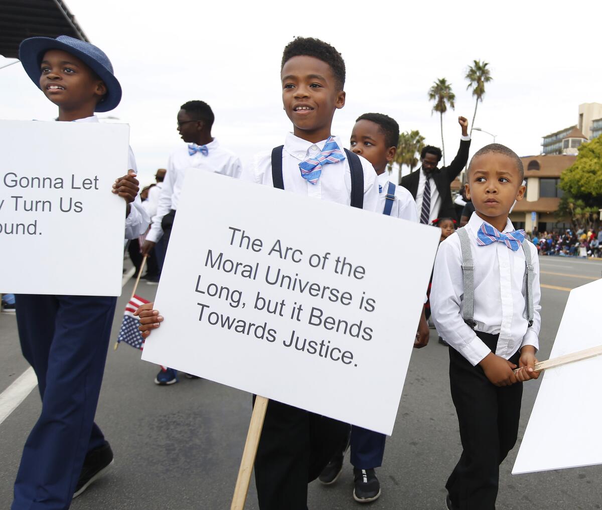 Children from Jack and Jill of America, Inc., San Diego Chapter, walk down Harbor Blvd during the 40th Annual Martin Luther King Jr. Day Parade on Jan. 19, 2020.