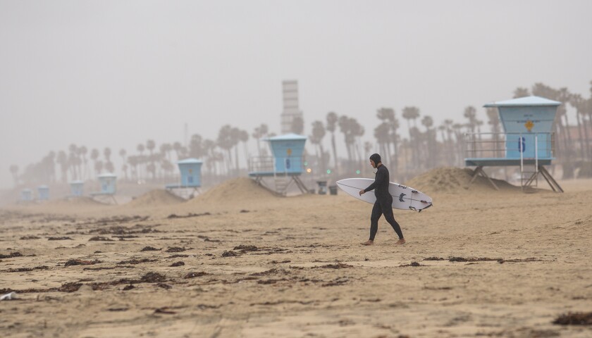 Surfers Find Ways To Get To The Waves In A World Of Shut Downs And Social Distancing Los Angeles Times