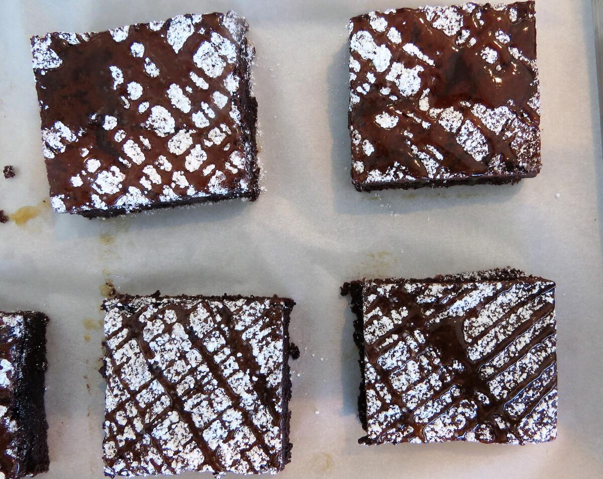 Caramel-glazed brownies in the display case at newly opened Camila's Bakery in Escondido.