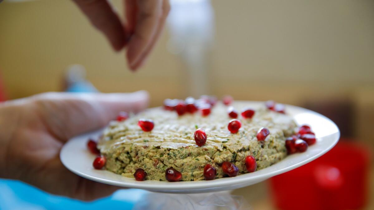 A hallmark of the Georgian table, pkhali incorporates a mixture of ground vegetables. Avetian's version is made from kidney beans with pomegranate seeds sprinkled on top.