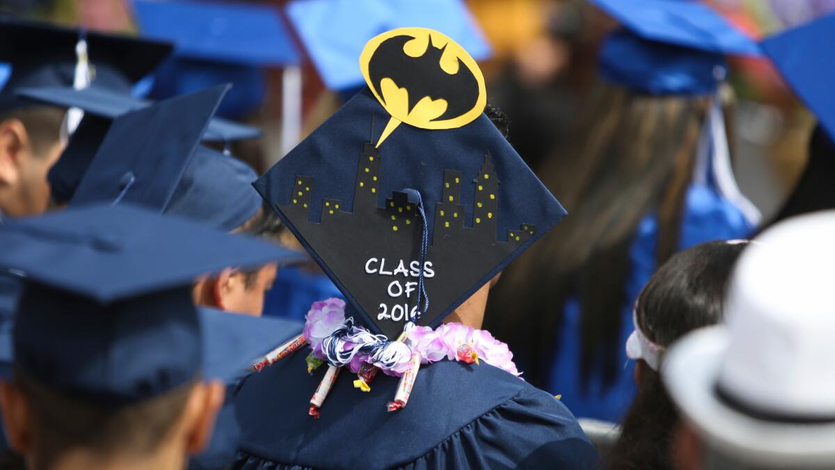 A graduation cap from the Los Angeles Unified School District continuation high school graduation at the East L.A. College football stadium.