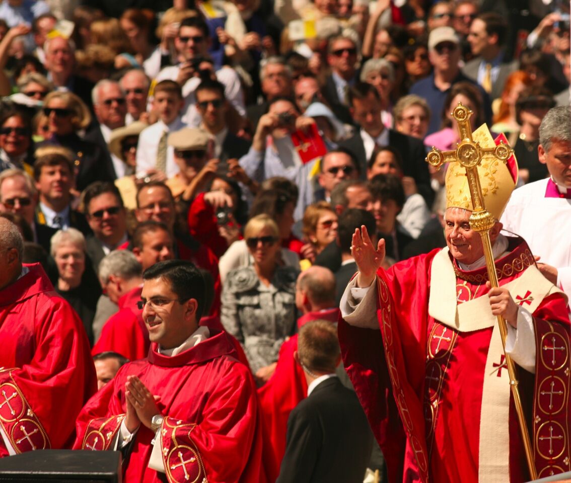 Pope Benedict XVI waves to the crowd as he leaves Nationals Park after the conclusion of Mass during a visit in 2008 to the United States.