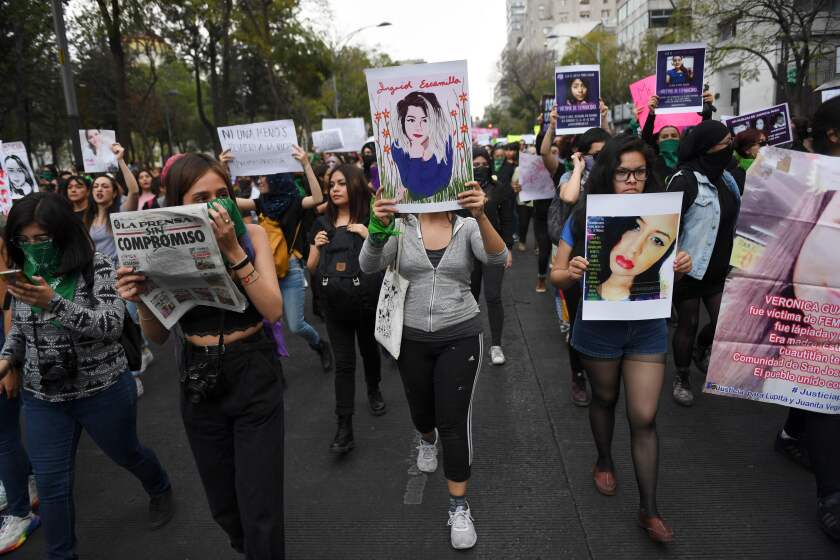 Women march in Mexico City, on February 14, 2020, during a protest against gender violence. - Several protests convened on Friday in the Mexican capital and other cities of the country after the murder of Ingrid Escamilla, 25, stabbed to death and then skinned by her partner in the north of Mexico City on February 9. (Photo by PEDRO PARDO / AFP) (Photo by PEDRO PARDO/AFP via Getty Images) ** OUTS - ELSENT, FPG, CM - OUTS * NM, PH, VA if sourced by CT, LA or MoD **