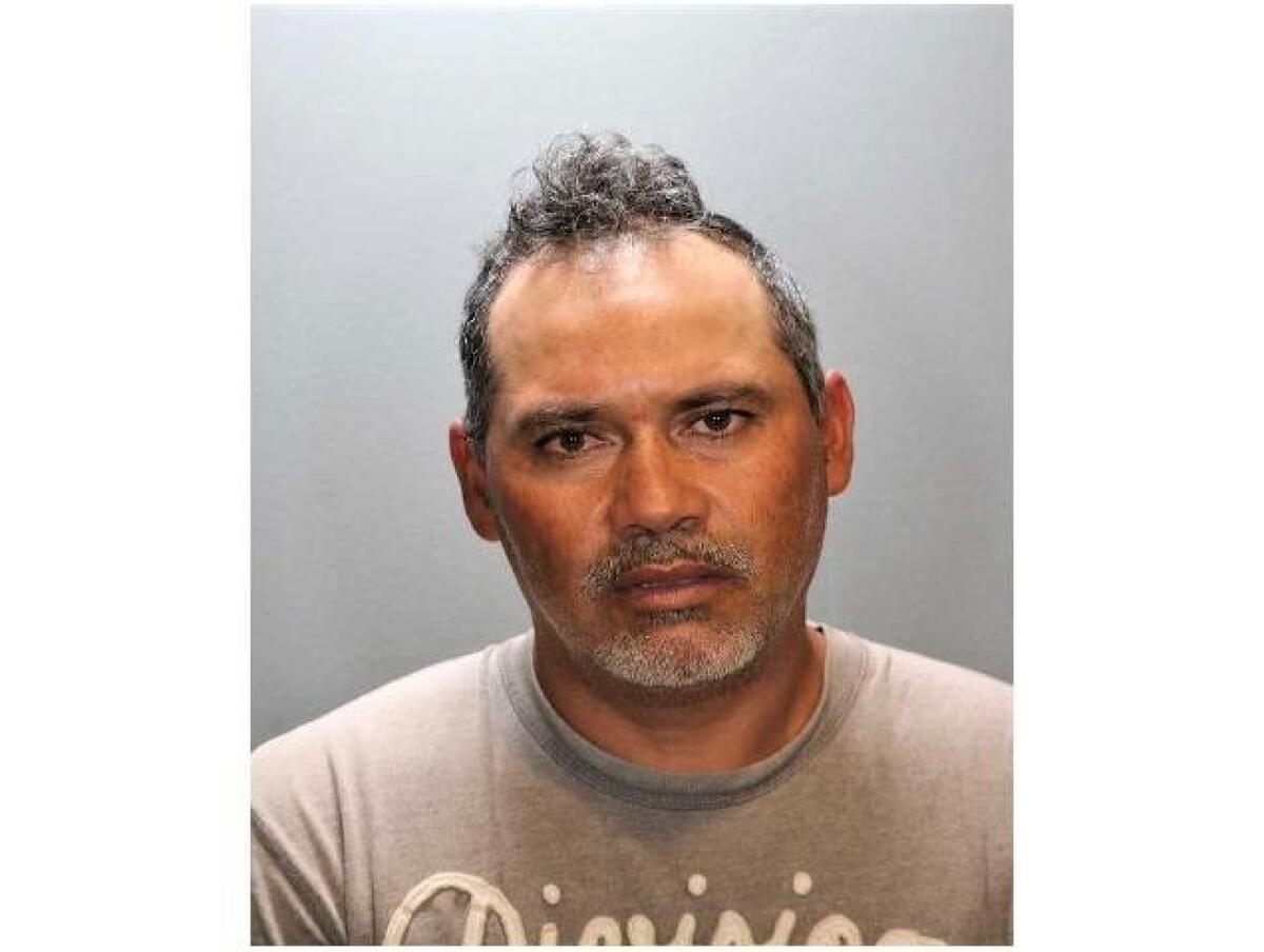 Arturo Silva-Ramos, 45, was arrested Sunday after allegedly pointing a gun at a motorist in Costa Mesa.