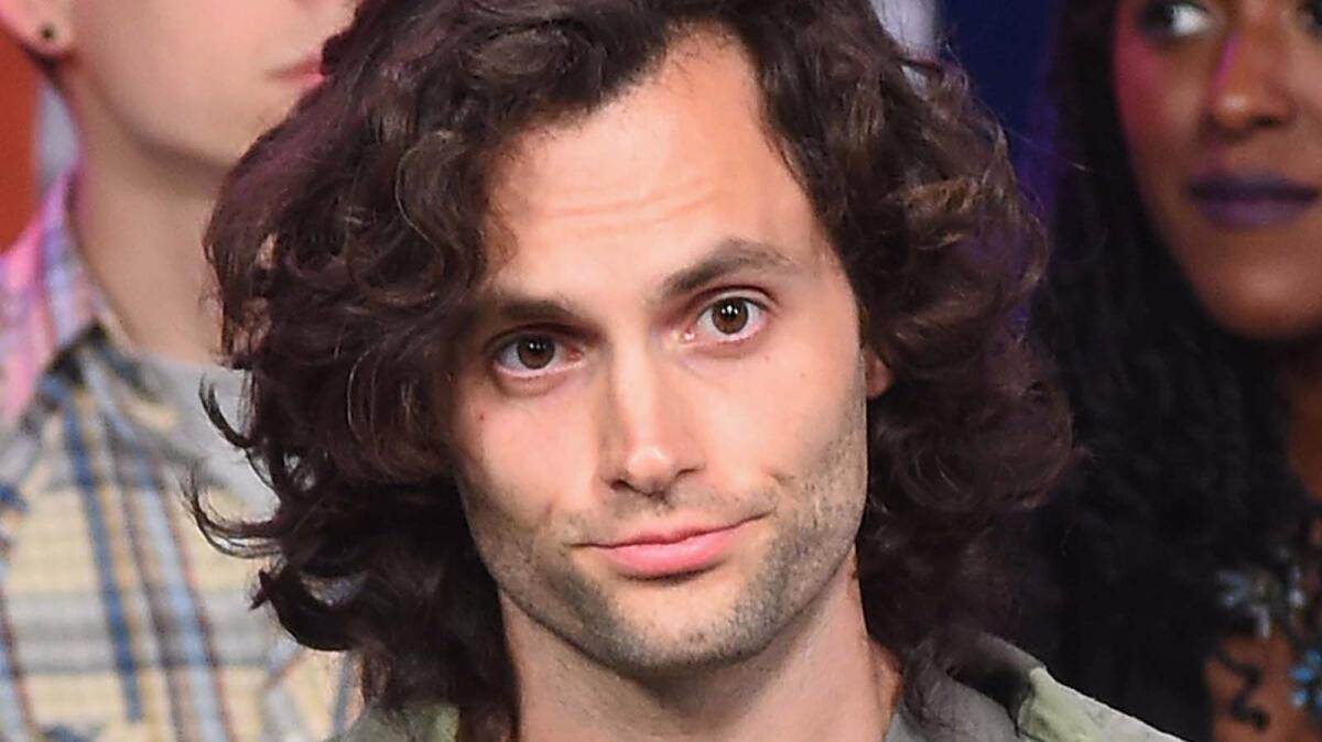 Penn Badgley, seen in 2016, before he cut his hair, is now a married man.