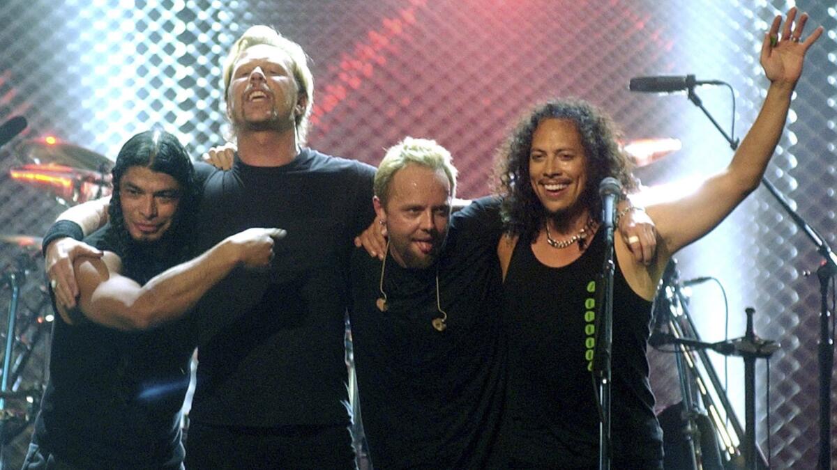 Metallica members, from left, Robert Trujillo, James Hetfield, Lars Ulrich and Kirk Hammett in 2003.