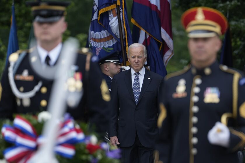 President Joe Biden and Defense Secretary Lloyd Austin arrive at The Tomb of the Unknown Soldier at Arlington National Cemetery in Arlington, Va., on Memorial Day, Monday, May 29, 2023. (AP Photo/Susan Walsh)