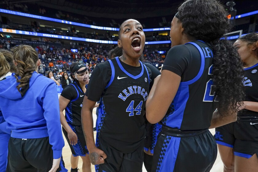 Kentucky's Dre'una Edwards (44) yells as players celebrate after beating Tennessee in an NCAA college basketball semifinal round game at the women's Southeastern Conference tournament Saturday, March 5, 2022, in Nashville, Tenn. Kentucky won 83-74. (AP Photo/Mark Humphrey)