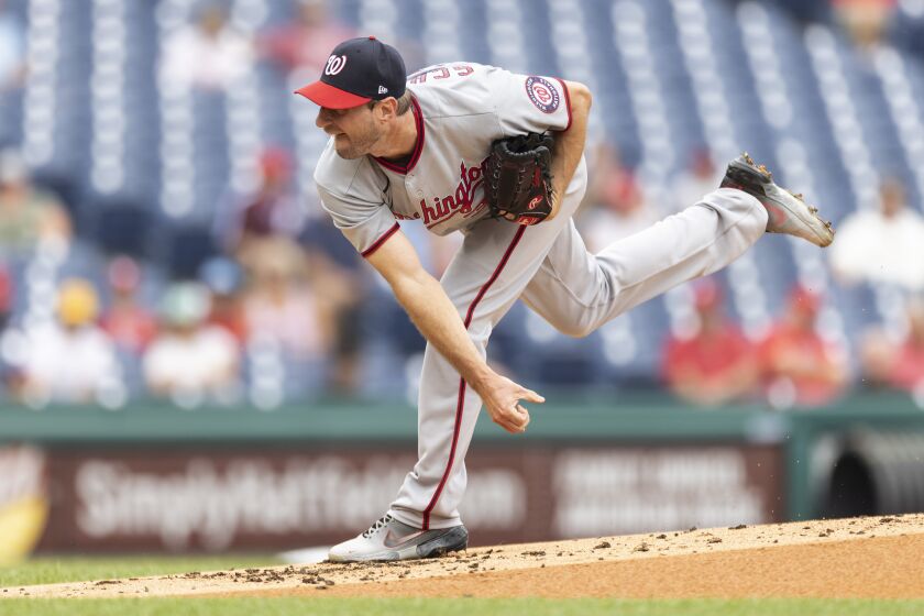 Washington Nationals starting pitcher Max Scherzer throws during the first inning of a baseball game against the Philadelphia Phillies, Thursday, July 29, 2021, in Philadelphia in the first game of a doubleheader. (AP Photo/Laurence Kesterson)