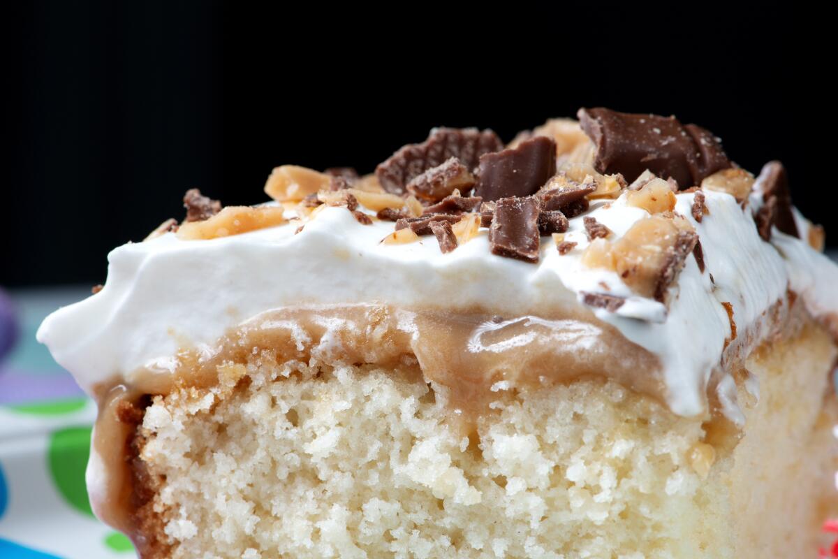 A serving of Candy Bar Sheet Cake.