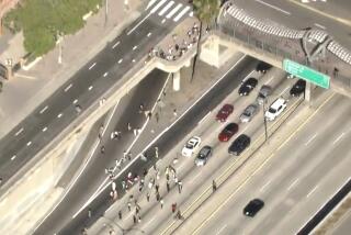 Pro-Palestinian protesters blocked all northbound lanes on the 101 Freeway in Downtown Los Angeles on Monday. The demonstration on the major thoroughfare started at about 4:45 p.m. The protesters walked from Los Angeles Street near City Hall to the nearby 101 Freeway onramp. Cars came to a screeching halt to avoid crashing into the handful of protesters. Several cars swerved by protesters as they walked across the freeway to the center divider.