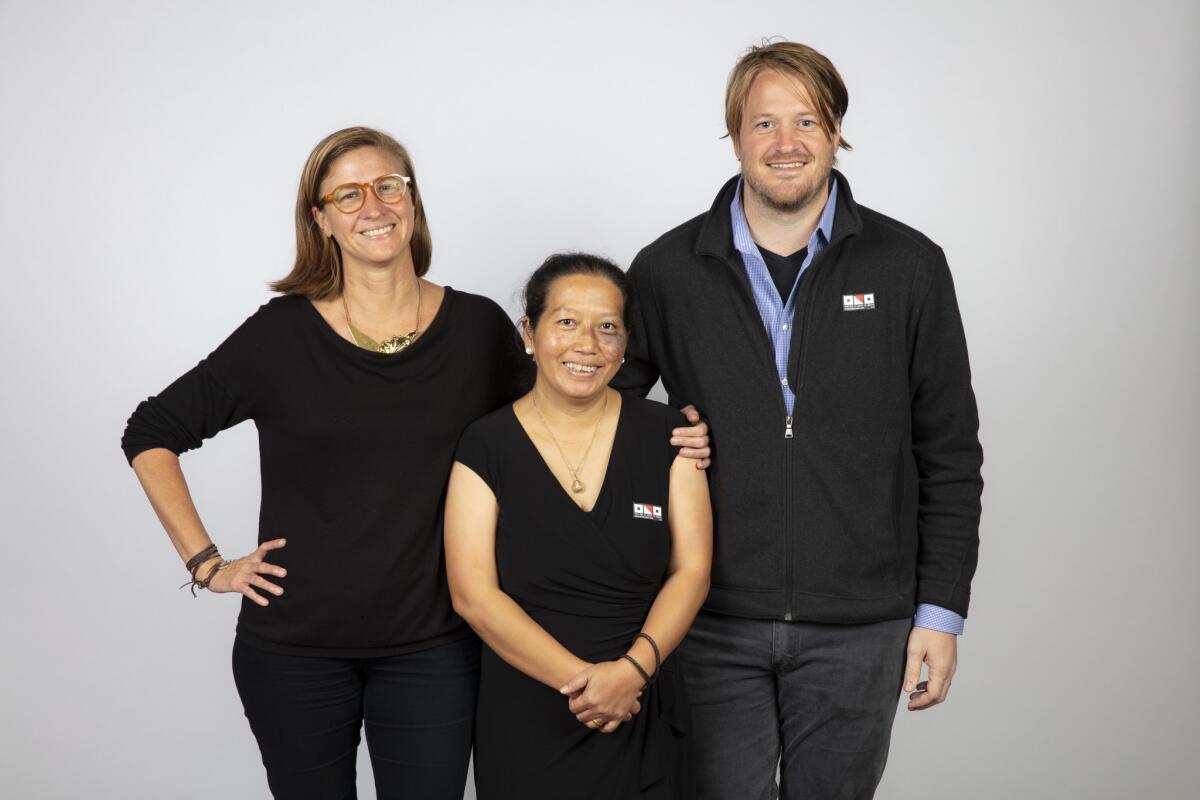 Director Shannon Service, subject Patima Tungpuchayakul and director Jeffrey Waldron from the film "Ghost Fleet."