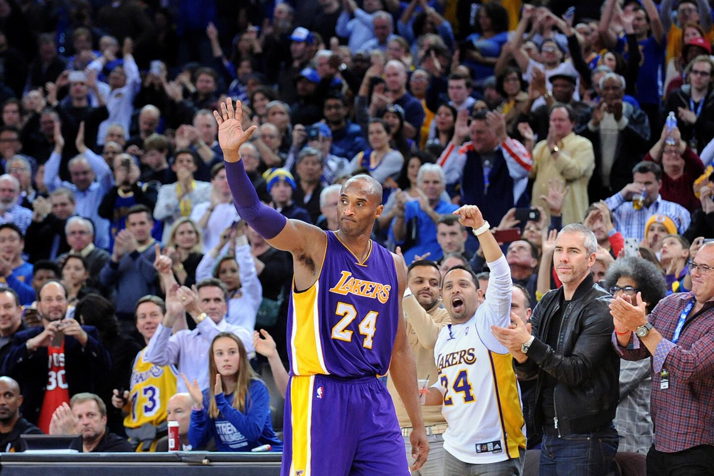 Lakers forwardKobe Bryant gets a standing ovation from the crowd at Oracle Arena as he exits a game against the Warriors on Jan. 14, 2016.
