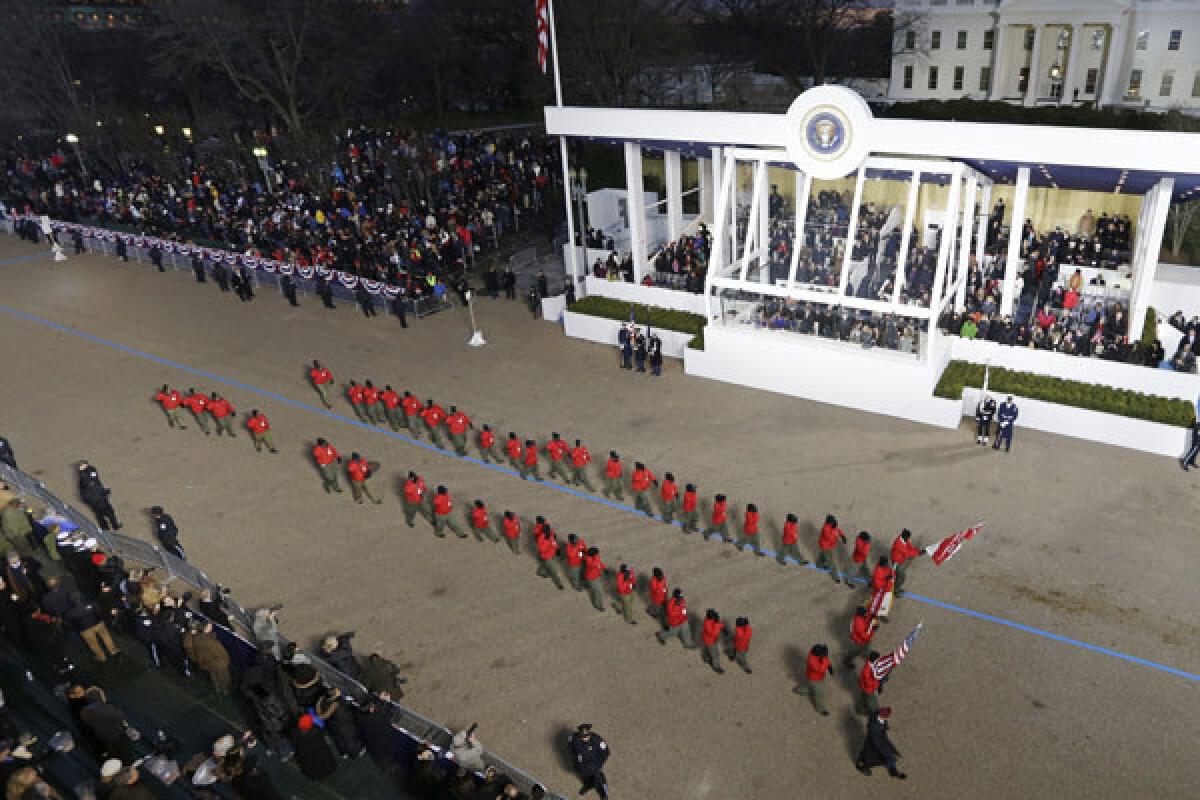 Boy Scout Troop 358 peforms while passing the presidential box during the Inaugural parade. The Boys Scouts of America announced that it is reconsidering excluding gays as leaders and youth members.