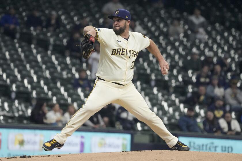 Milwaukee Brewers pitcher Wade Miley throws during the first inning of a baseball game against the San Diego Padres Tuesday, April 16, 2024, in Milwaukee. (AP Photo/Morry Gash)