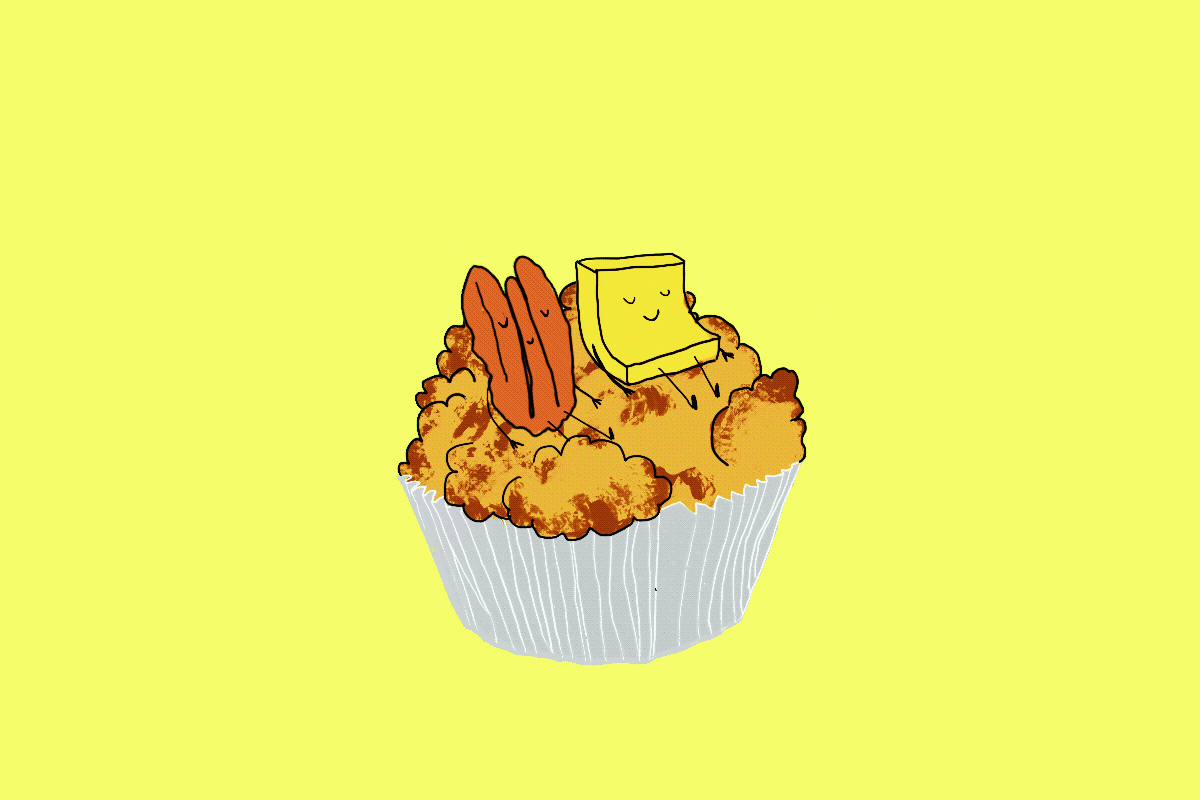 Walnuts and butter tuck themselves into a banana muffin.